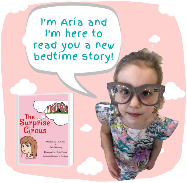 Aria reading the book The Surprise Circus artwork